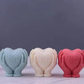 Vela Decorativa Manos con Corazón y Mariposa